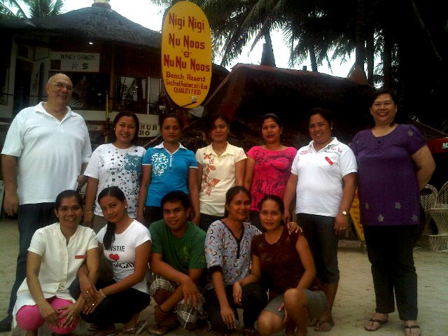 Class #3 graduates posing with Bollie Bolton, standing extreme left, Senior Operations Manager and Bel Ochoa, co-facilitator, extreme right.